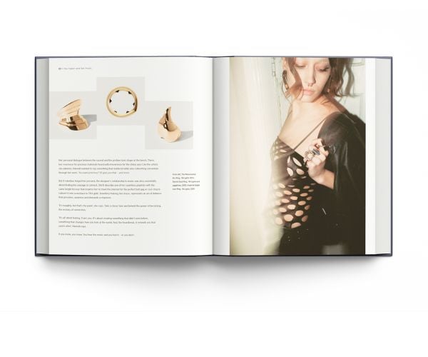 Book cover of Hannah Martin: Iconoclast; featuring the jeweler wearing safety pin earrings. Published by ACC Art Books.