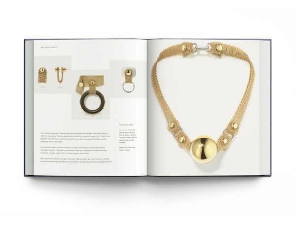 Book cover of Hannah Martin: Iconoclast; featuring the jeweler wearing safety pin earrings. Published by ACC Art Books.