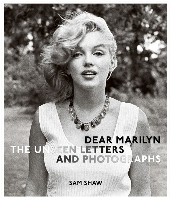 Book cover of Dear Marilyn: The Unseen Letters and Photographs; featuring Monroe in a white top. Published by ACC Art Books.