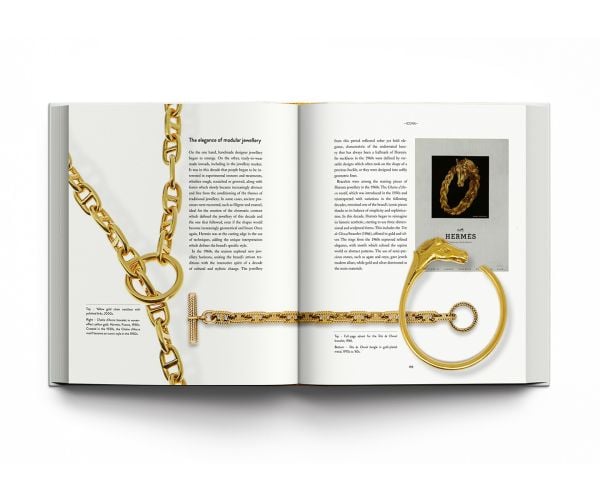 Book cover of Hermés Philosophy; featuring a model wearing a white linen shirt with a fabric and leather belt wrapped around waist. Published by ACC Art Books.