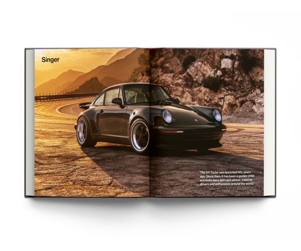 Book cover of Restomods: The New World Order of Handcrafted Cars, featuring a Carbon Porsche 935. Published by ACC Art Books.