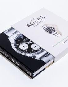 Book cover of The Rolex Legacy: The history of Rolex through 120 seminal and rare watches; featuring a silver Rolex watch. Published by ACC Art Books.
