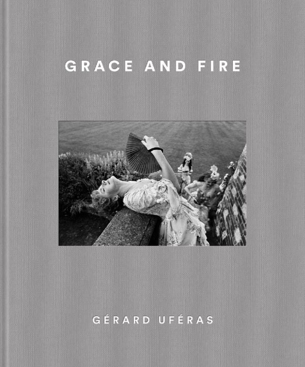Book cover of Grace and Fire, featuring a model waving a fan while she leans backwards over a wall . Published by Kulturalis.