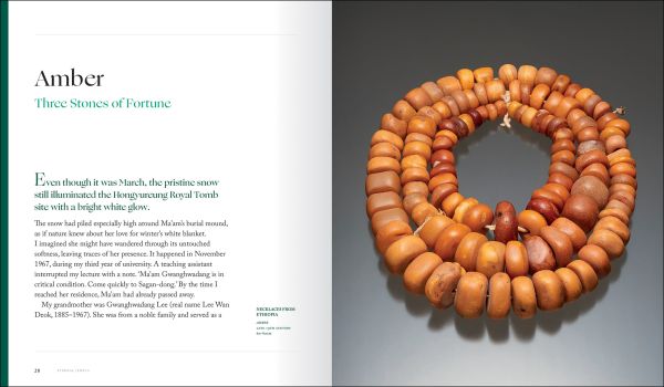 Book cover of Eternal Jewels: A Collector's Journey; featuring a cameo brooch made with emerald, diamond, pearl and gold. Published by Kulturalis.