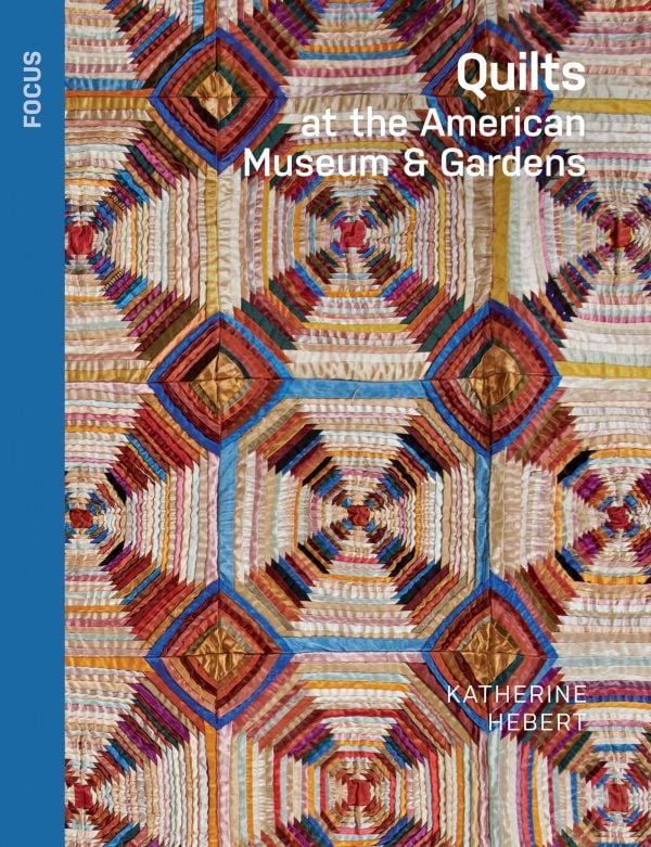 Book cover of Quilts at the American Museum & Gardens; featuring a bright coloured quilt with a star pattern. Published by Kulturalis.