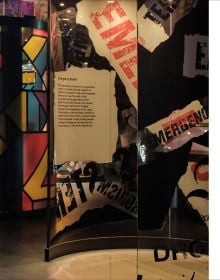 Book cover of EPIC The Irish Emigration Museum: Ireland Never Leaves You; showcasing a striking installation of illuminated metal rods radiating from a purple lit gallery. Published by Kulturalis.