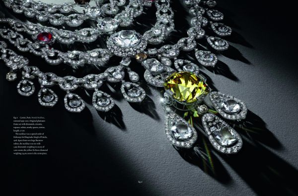 Grey book cover of 'Diamonds Across Time, Facets of Mankind' featuring a large yellow sapphire to center. Published by World Diamond Museum.