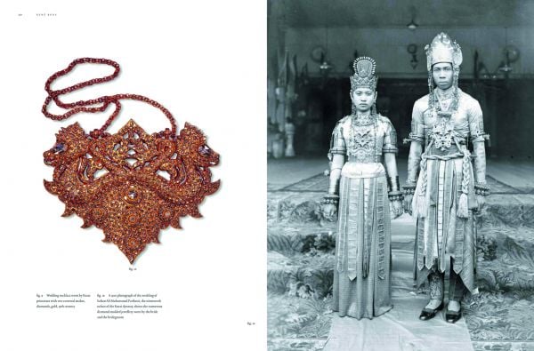 Grey book cover of 'Diamonds Across Time, Facets of Mankind' featuring a large yellow sapphire to center. Published by World Diamond Museum.