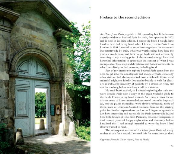 Vineyard with French commune behind, on travel guide cover of 'Half an Hour from Paris, 12 Secret Daytrips by Train', by Pallas Athene.