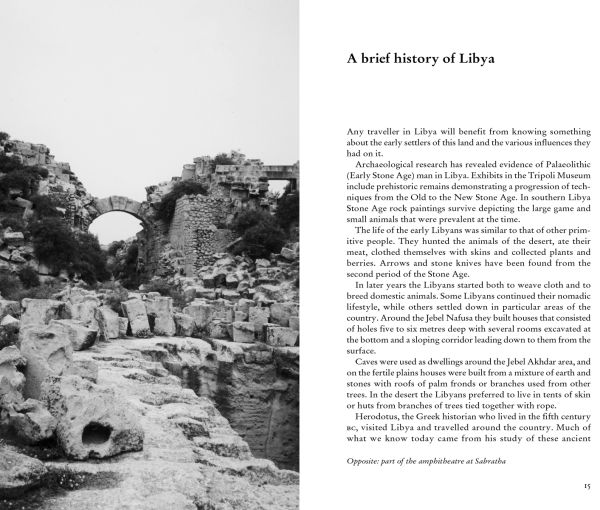 Book cover of Wendy Gower's Libya, with part of a column from the historical city seen through a dark archway. Published by Pallas Athene.
