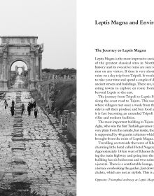 Dark archway in a Libyan city with tall column standing in the light, 'LIBYA', in red font above.