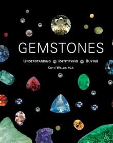 Book cover of Gemstones: Understanding, Identifying, Buying, with multi-coloured gemstones. Published by ACC Art Books.
