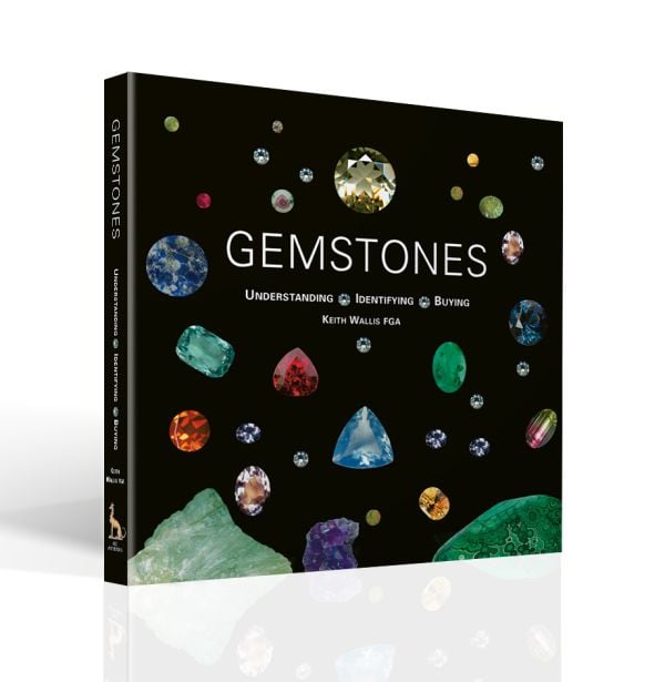Book cover of Gemstones: Understanding, Identifying, Buying, with multi-coloured gemstones. Published by ACC Art Books.