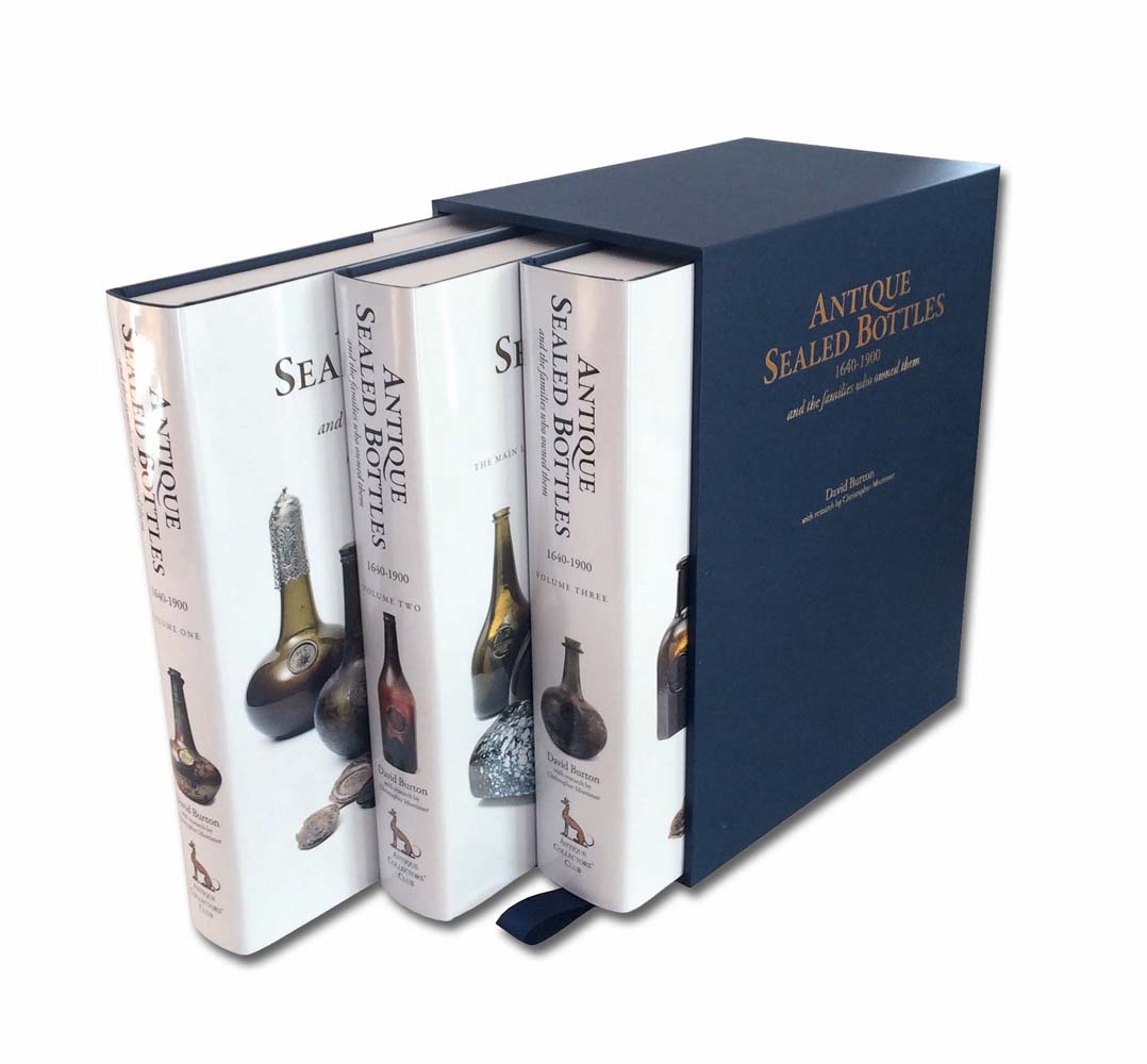 Box-set of three volumes of Antique Sealed Bottles 1640-1900 and the Families that Owned Them. Published by ACC Art Books.