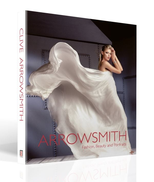 Book cover of Clive Arrowsmith: Fashion, Beauty & Portraits, featuring model Lisa Seffiert in billowing white Gucci dress. Published by ACC Art Books.