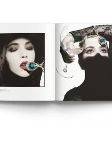 Book cover of Clive Arrowsmith: Fashion, Beauty & Portraits, featuring model Lisa Seffiert in billowing white Gucci dress. Published by ACC Art Books.
