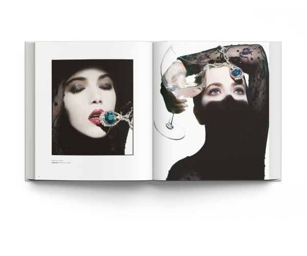 Book cover of Clive Arrowsmith: Fashion, Beauty & Portraits, featuring model Lisa Seffiert in billowing white Gucci dress. Published by ACC Art Books.
