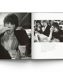 Book cover of Breaking Stones, featuring The Rolling Stones with Brian Jones, standing on city street. Published by ACC Art Books.