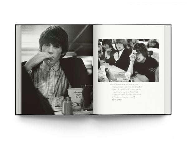 Book cover of Breaking Stones, featuring The Rolling Stones with Brian Jones, standing on city street. Published by ACC Art Books.