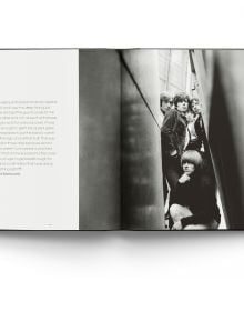 Book cover of Breaking Stones, featuring The Rolling Stones with Brian Jones, standing on city street. Published by ACC Art Books.