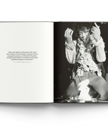 Book cover of Burning Desire: The Jimi Hendrix Experience Through the Lens of Ed Caraeff; featuring rock guitar legend Jimi Hendrix setting fire to his Fender Stratocaster. Published by ACC Art Books.