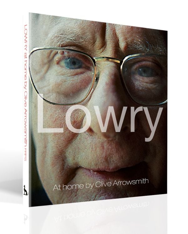 Book cover of Lowry: At Home, featuring the artist in his later years. Published by ACC Art Books.
