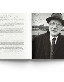 Book cover of Lowry: At Home, featuring the artist in his later years. Published by ACC Art Books.
