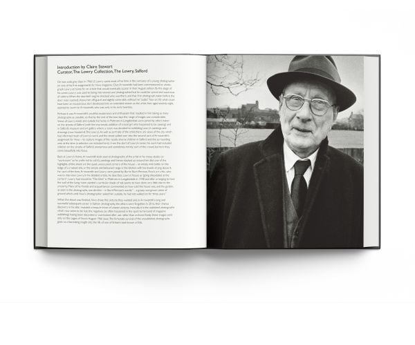 Book cover of Lowry: At Home, featuring the artist in his later years. Published by ACC Art Books.