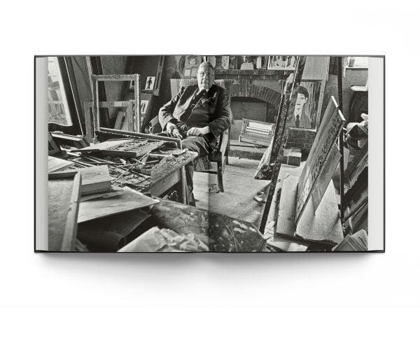 Book cover of Lowry: At Home, featuring the artist in his later years. Published by ACC Art Books.