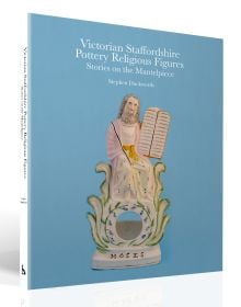 Book cover of Victorian Staffordshire Pottery Religious Figures, featuring a biblical figurine of 'Moses'. Published by ACC Art Books.
