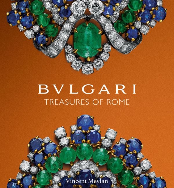 Book cover of Bulgari Treasures of Rome, featuring two halves of sapphire and emerald gemstones encrusted jewelry. Published by ACC Art Books.