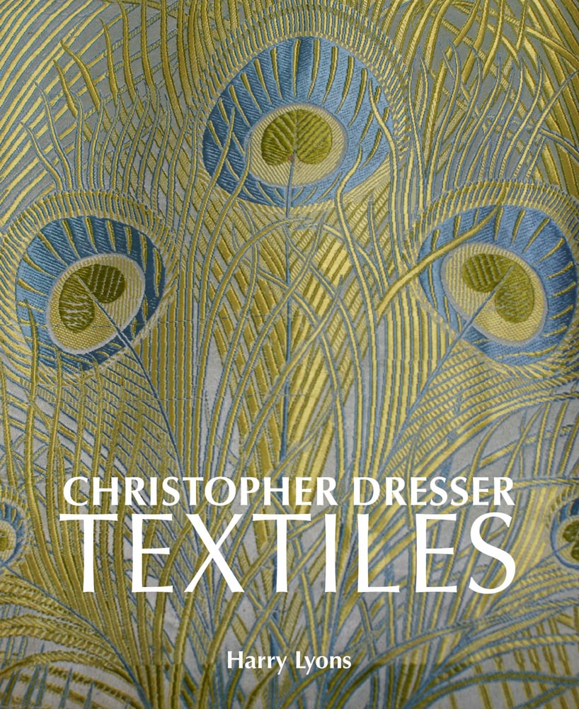 Luxury gold and blue peacock design fabric, Christopher Dresser Textiles Harry Lyons in white font below.