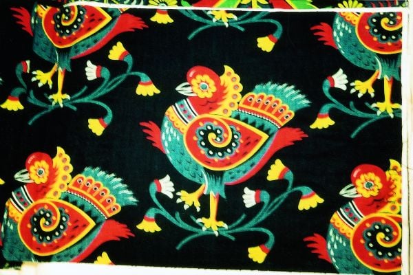 Arts and Crafts Christopher Dresser Peacock plumes print, on cover of 'Christopher Dresser Textiles', by ACC Art Books.