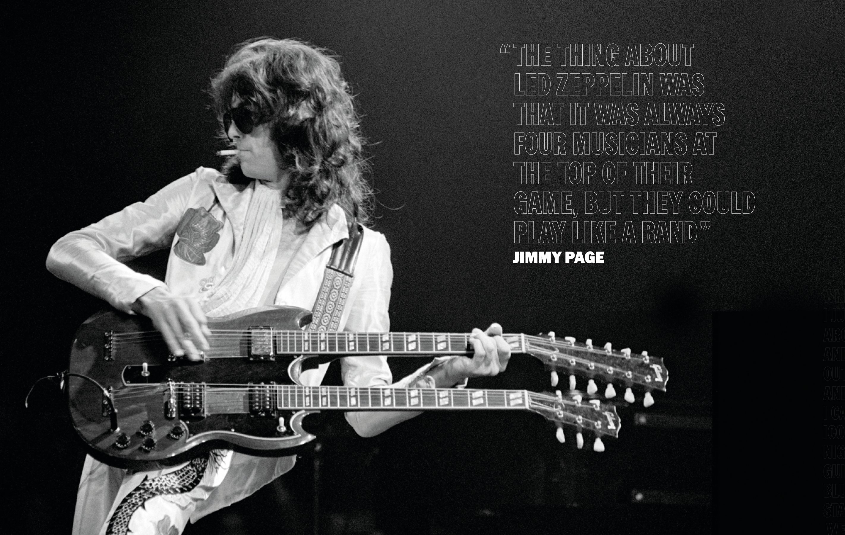 Dramatic live black and white shot of Jimmy Page playing electric guitar on stage illuminated by spotlight with Led Zeppelin Live 1975-1977 in gold and white font below