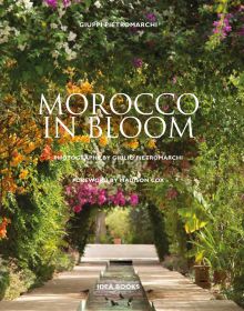 Exotic archway of Mediterranean flowering bougainvillea trees, on cover of 'Morocco in Bloom', by ACC Art Books.