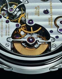 Jean Daniel Nicolas 2-Minute Tourbillon watch mechanism, on white cover of 'Watchmakers', by ACC Art Books.