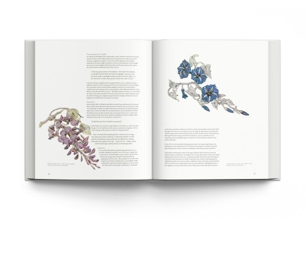 Small diamond encrusted jewelry piece with three larger gemstones, on cover of '21st-Century Jewellery Designers An Inspired Style', by ACC Art Books.