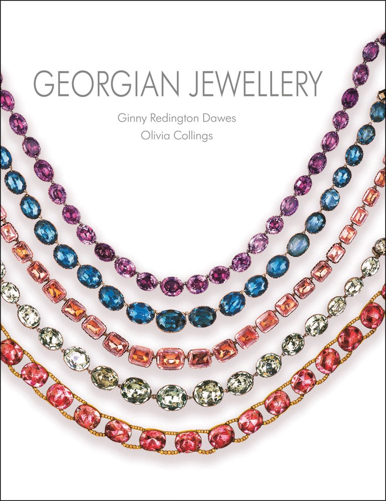 Five colourful jewelled necklaces draped across white cover of 'Georgian Jewellery, 1714-1830', by ACC Art Books.