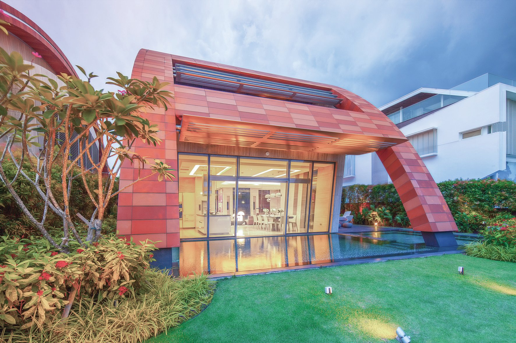 Book cover of Mercurio Design Lab: Italian Design in Asia, featuring a luxury residential building 'Villa Vento', with a swimming pool. Published by Images Publishing.