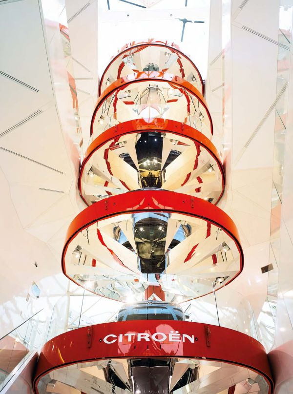 Book cover of Manuelle Gautrand Architecture: Leading Architects, featuring a high rise building with external side grills. Published by Images Publishing.