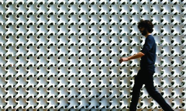 Book cover of Still Facing Infinity: Sculpture by Erwin Hauer, featuring a large-scale black sculpture. Published by Images Publishing.