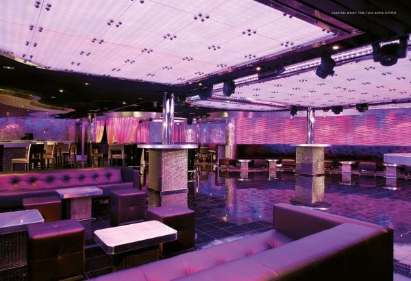 Book cover of Design on the High Seas: Setting the Scene for Entertainment Architecture Aboard Cruise Ships, featuring a grand theatre interior with stage area. Published by Images Publishing.