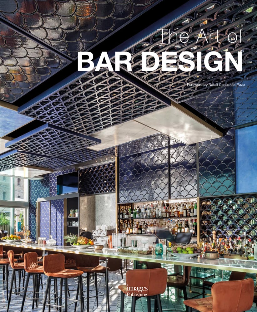 Restaurant bar interior, scallop wall facings, orange stools, The Art of Bar Design in white font to top right