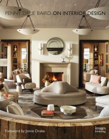Book cover of On Interior Design featuring a beige interior space, with a sofa to center, an open fire and hanging light fittings from ceiling. Published by Images Publishing.