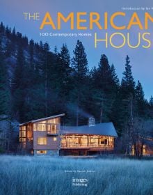 Book cover of The American House: 100 Contemporary Homes, featuring a a cabin at the bottom of the mountains. Published by Images Publishing.
