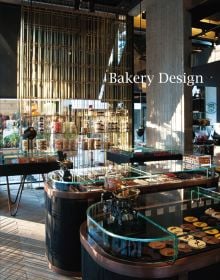 Book cover of Bakery Design, featuring the a bakery shop interior with glass display cabinets, with cakes underneath. Published by Images Publishing.