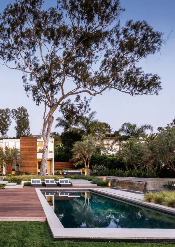 Book cover of Critical Skills for Solving Design Problems, with a modern gray flat roof building surrounded by large green trees. Published by Images Publishing.