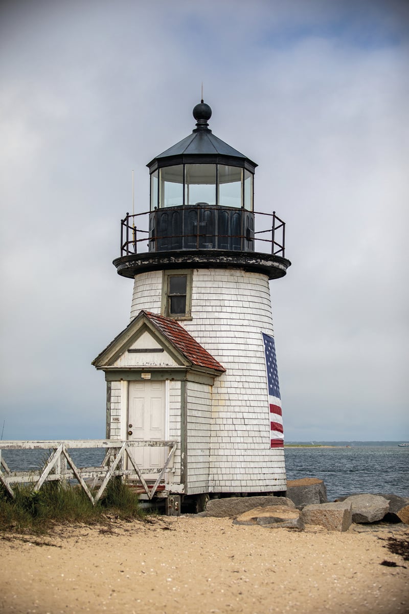 Blue cover with orange silhouette of grass, NANTUCKET Classic American style 30 miles out to sea in white font above.