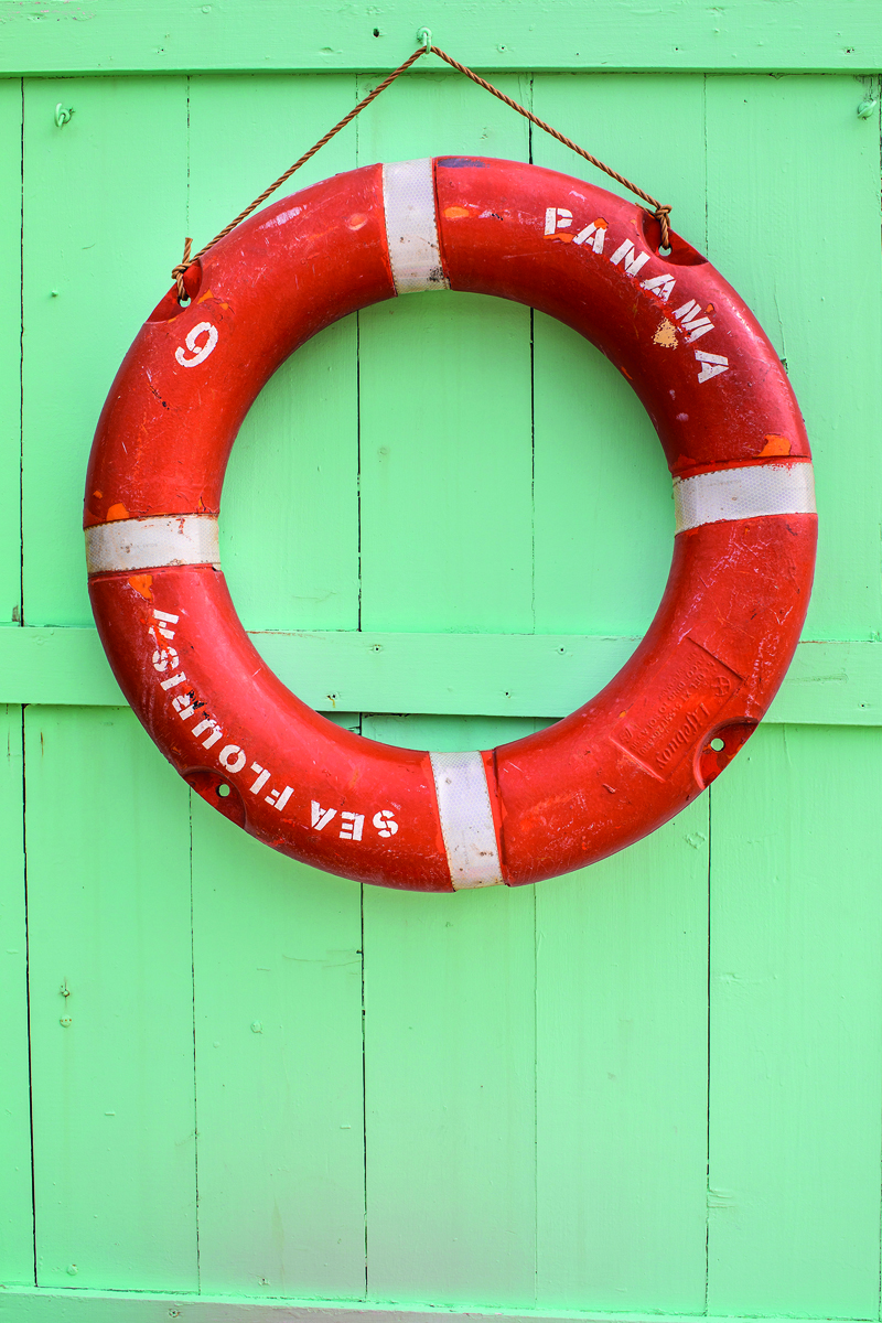 Blue cover with orange silhouette of grass, NANTUCKET Classic American style 30 miles out to sea in white font above.