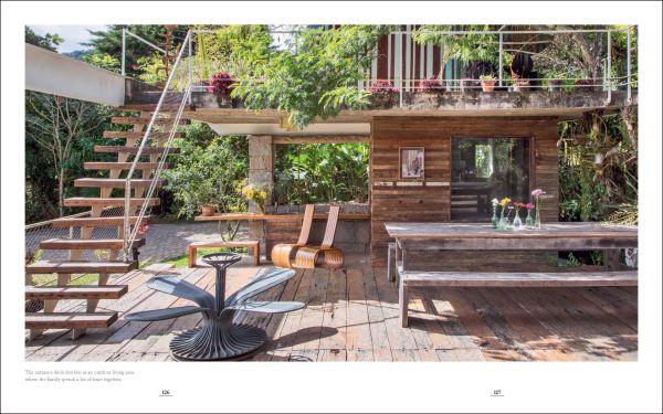 Book cover of Artists' Homes Designing Spaces for Living a Creative Life, with a bright open interior art studio space with artist sitting at painting easel. Published by Images Publishing.